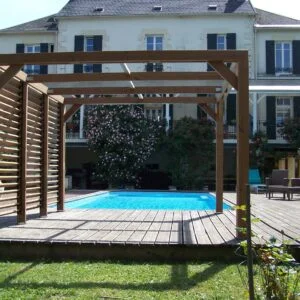 THO 3531 V Pergola fabriquée en bois massif traité très haute température / dimensions 3,41x3,13 m / Livré avec ventelles mobiles / Très belle finition bois / Environnemental et quasiment sans entretien / Fabriqué en France / Garantie : 10 ans*