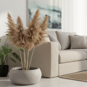 Vase rond plat Nova ton anthracite Ø 60 cm posé au sol dans un salon à côté d'un canapé