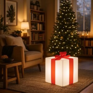 Cadeau lumineux led de Noël 40 cm - Visuel principal représentant le cadeau lumineux LED au pied d'un sapin dans une décoration intérieure cocoon