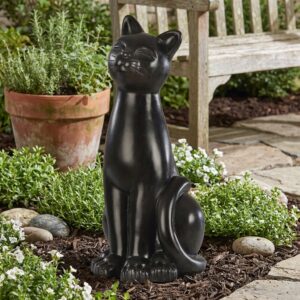 Statue chat extérieur en pierre, sculpture de chat noir assis, jardin avec plantes et banc, statue chat exterieur 215958